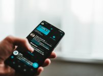 person holding black android smartphone